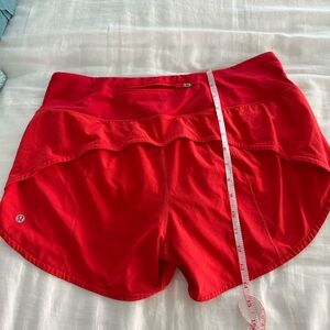 Size 10 zip back bright orange shorts Lululemon